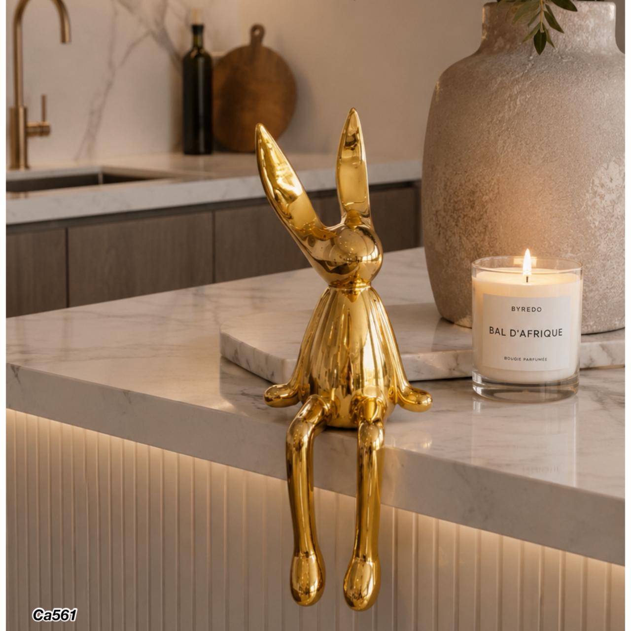 Articulo decorativo conejo dorado grande 14cm* 12cm* 36cm